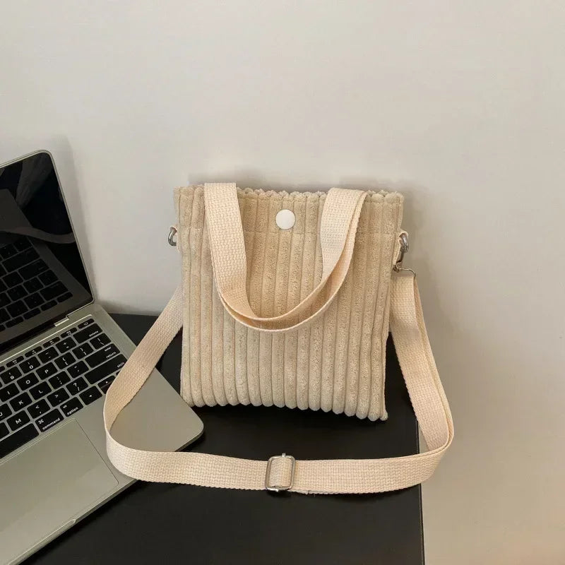Amblot Beige Corduroy handbag with front button detail
