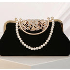 Amblot Black Corduroy clutch bag with decorative closure