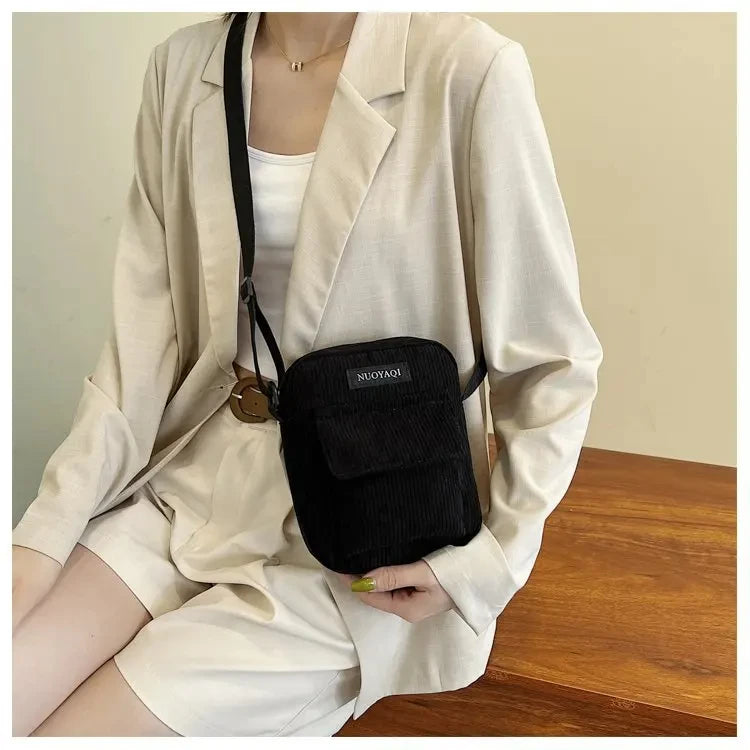 Amblot Black Corduroy crossbody handbag with front pocket