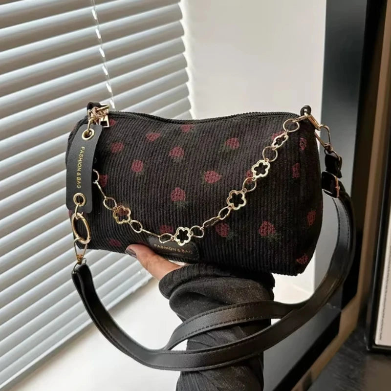 Amblot Black corduroy handbag with strawberry print