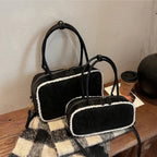 Amblot Black / Small Elegant suede handbag with vintage charm
