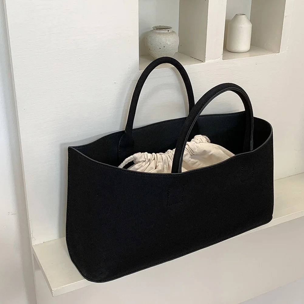 Amblot Black Suede tote bag with structured silhouette