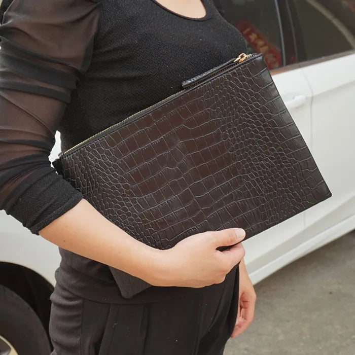 Amblot Black Textured leather clutch