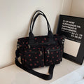 Amblot Black Women’s strawberry print corduroy tote bag