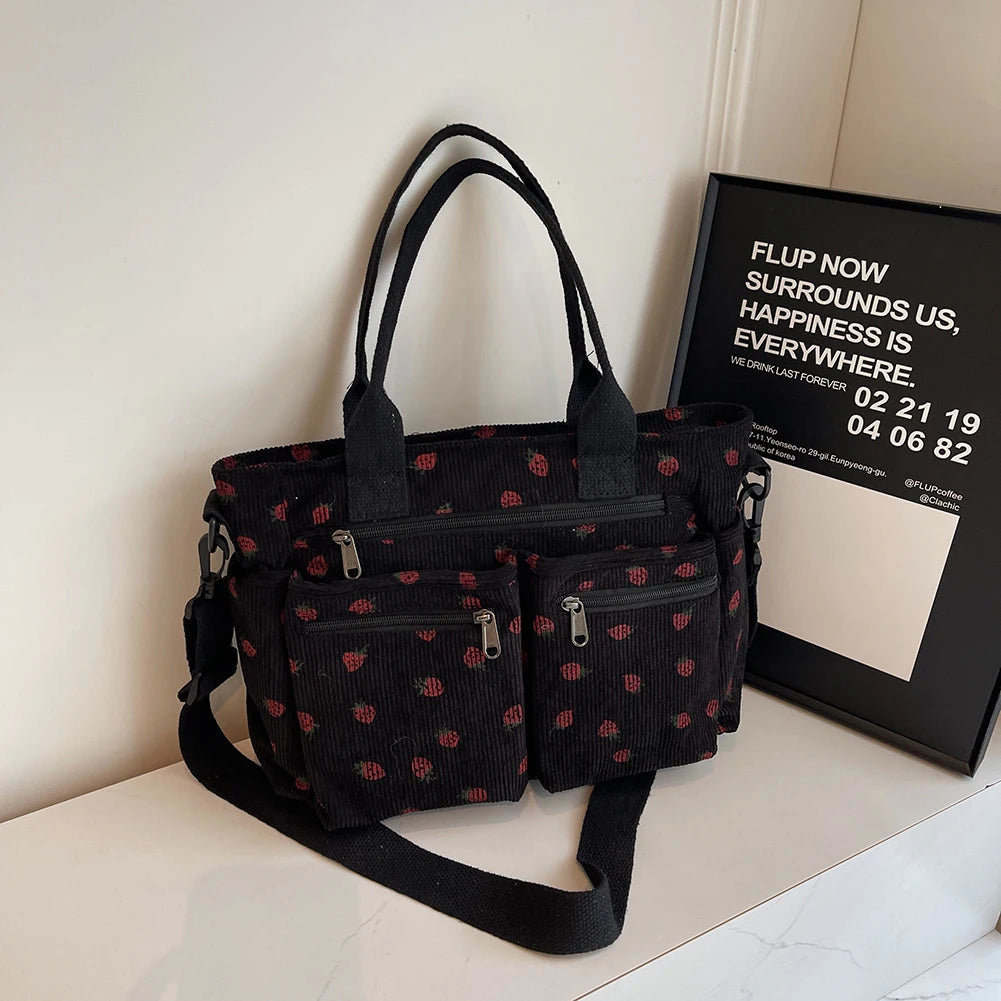 Amblot Black Women’s strawberry print corduroy tote bag