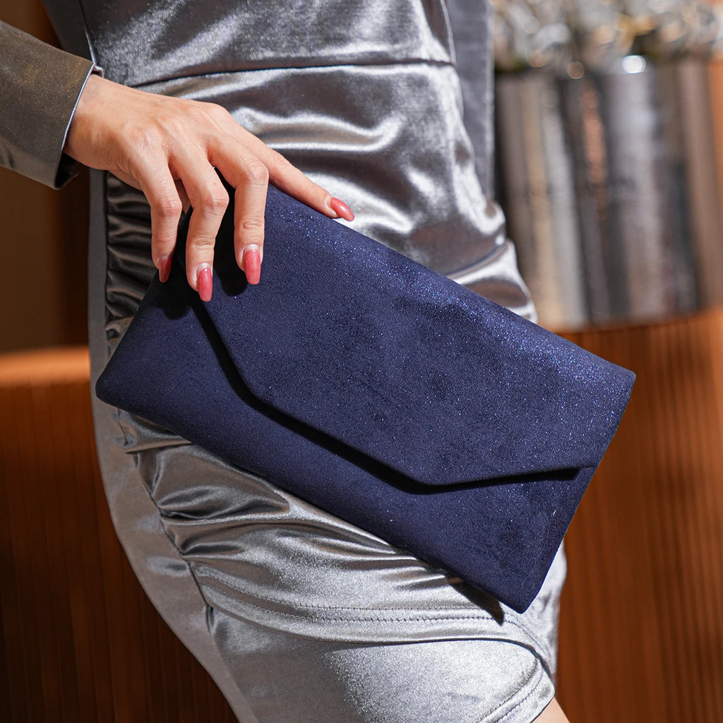 Amblot Blue Corduroy envelope clutch bag with magnetic closure