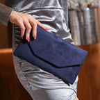 Amblot Blue Corduroy envelope clutch bag with magnetic closure