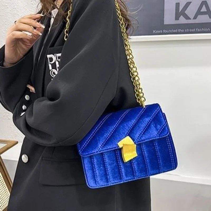 Amblot Blue Corduroy handbag with chain and flap closure