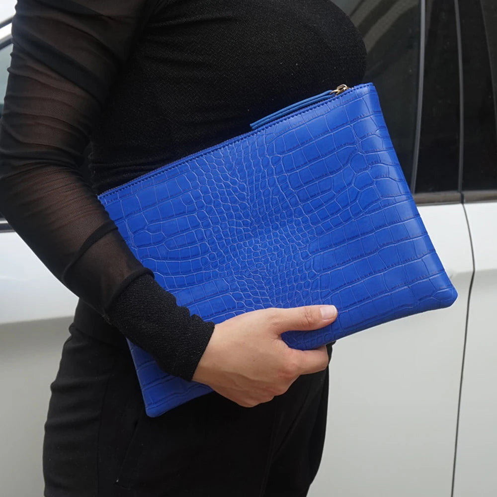 Amblot Blue Textured leather clutch
