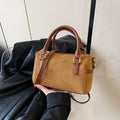 Amblot Brown High-end suede purse with structured body