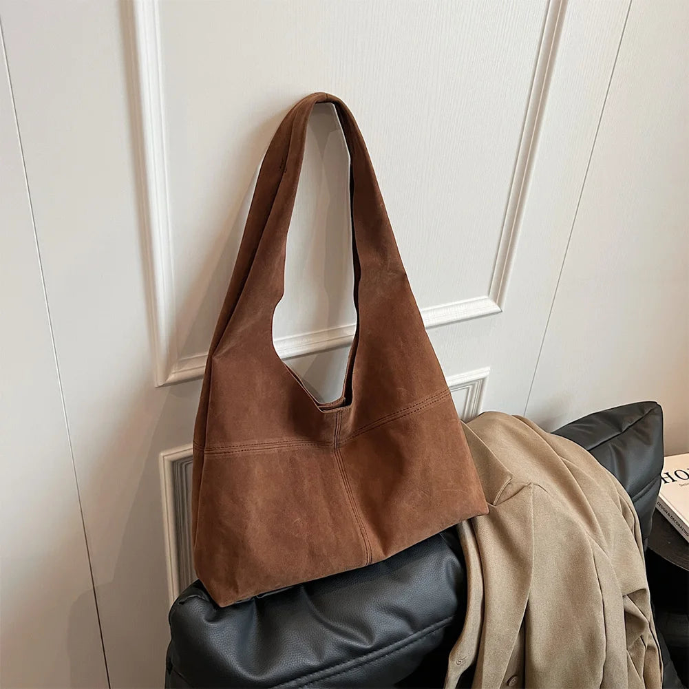 Amblot Brown Slouch-style suede handbag