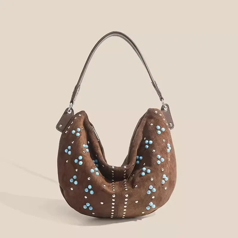 Amblot Brown Soft suede handbag with elegant curved silhouette