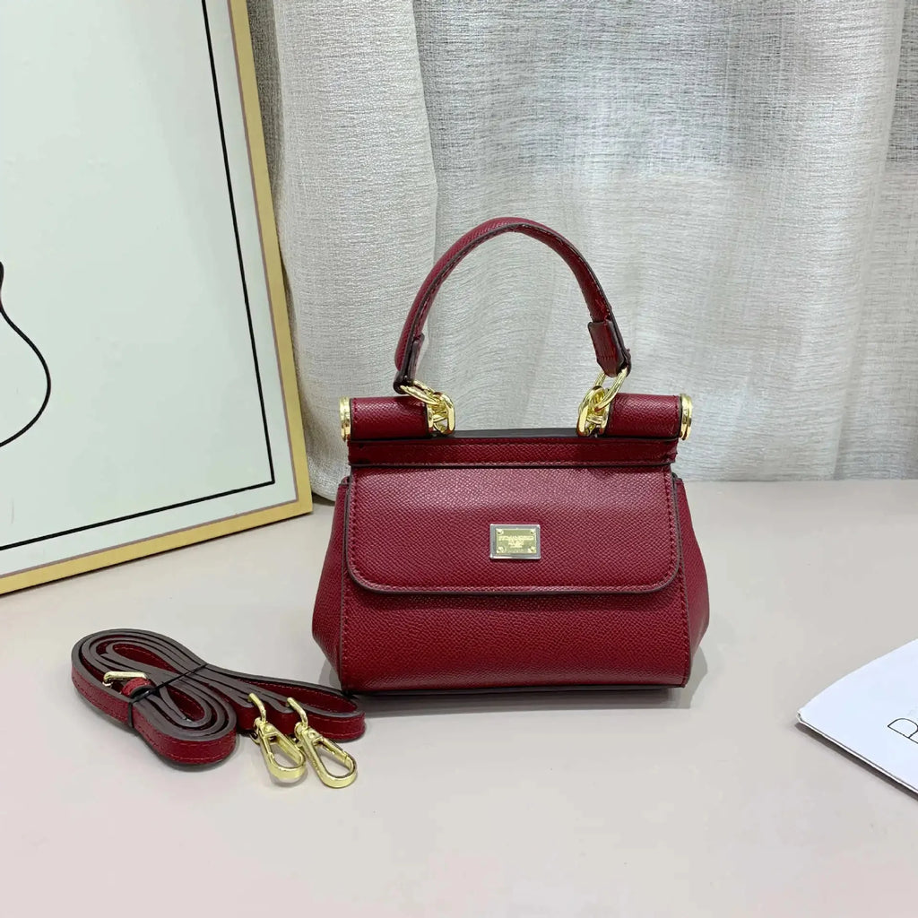 Amblot Burgundy Elegant leather handbag