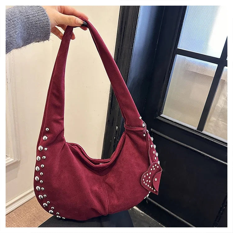Amblot Chic suede shoulder bag with decorative strass