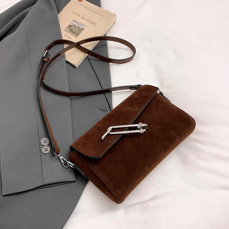 Amblot Coffee Structured suede handbag with minimalist shape