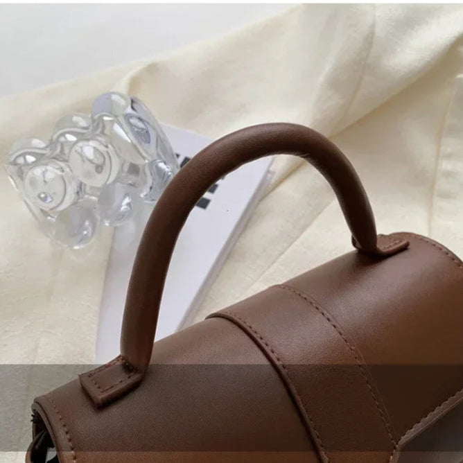 Amblot Compact leather sling bag for daily essentials