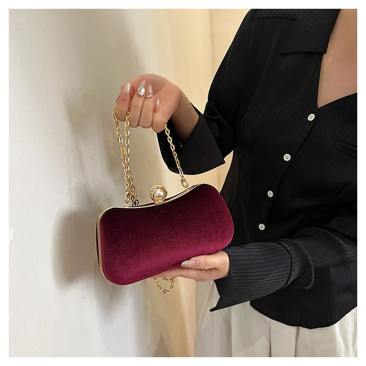 Amblot Corduroy clutch bag with  chain strap