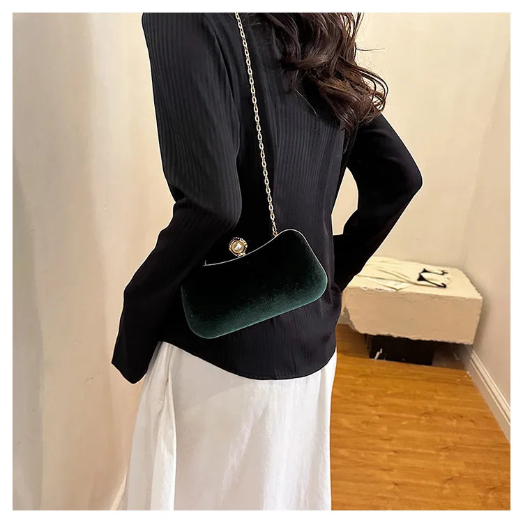 Amblot Corduroy clutch bag with  chain strap