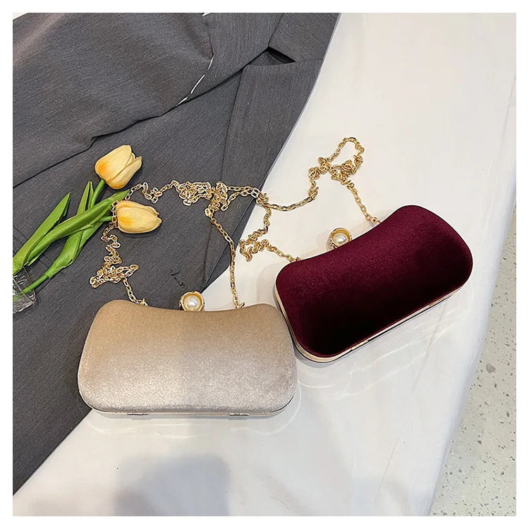 Amblot Corduroy clutch bag with  chain strap