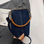 Amblot Dark Blue Distressed denim clutch bag with vintage vibes