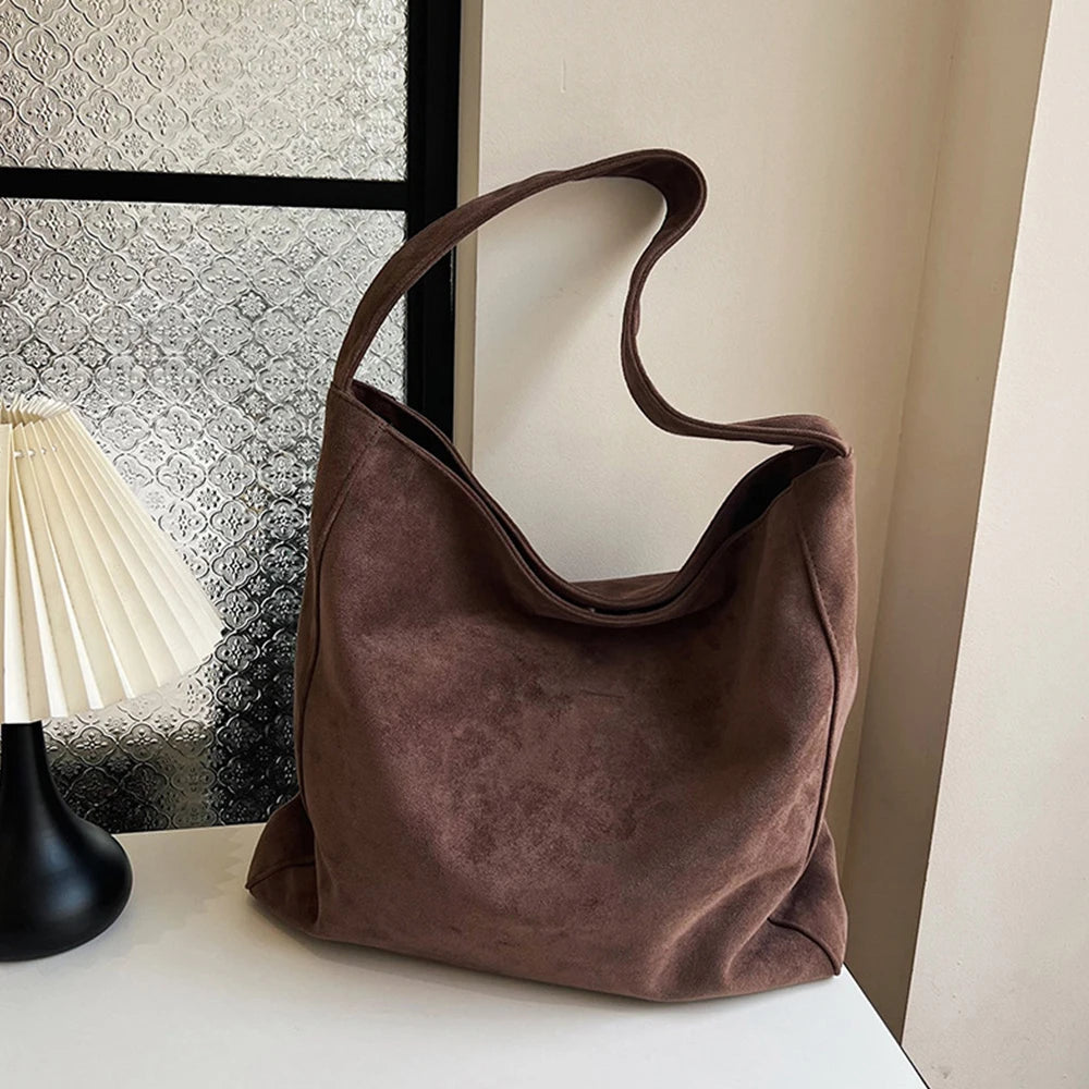 Amblot Dark Brown Suede slouch bag with relaxed boho silhouette