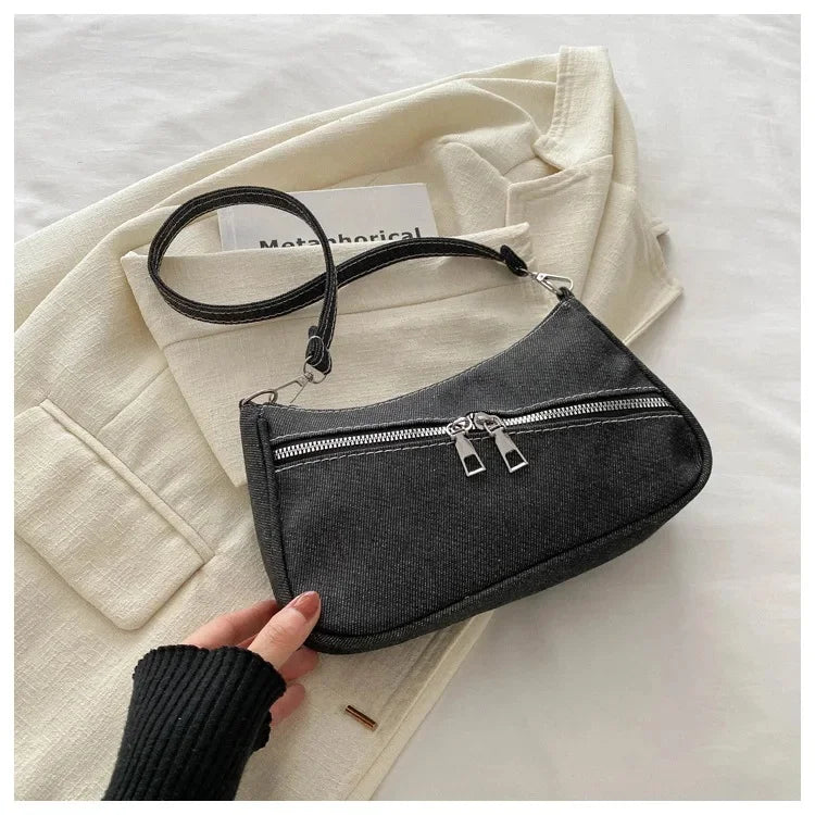 Amblot Denim evening clutch bag