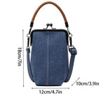 Amblot Distressed denim clutch bag with vintage vibes