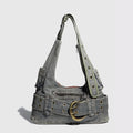 Amblot Distressed denim crossbody handbag with double zip