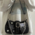 Amblot Edgy black denim handbag with buckle strap