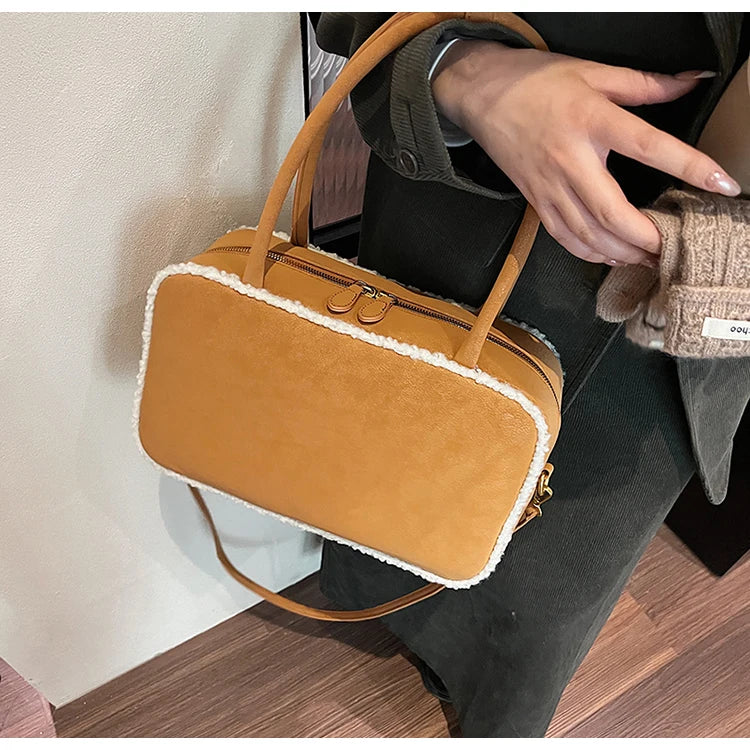 Amblot Elegant suede handbag with vintage charm