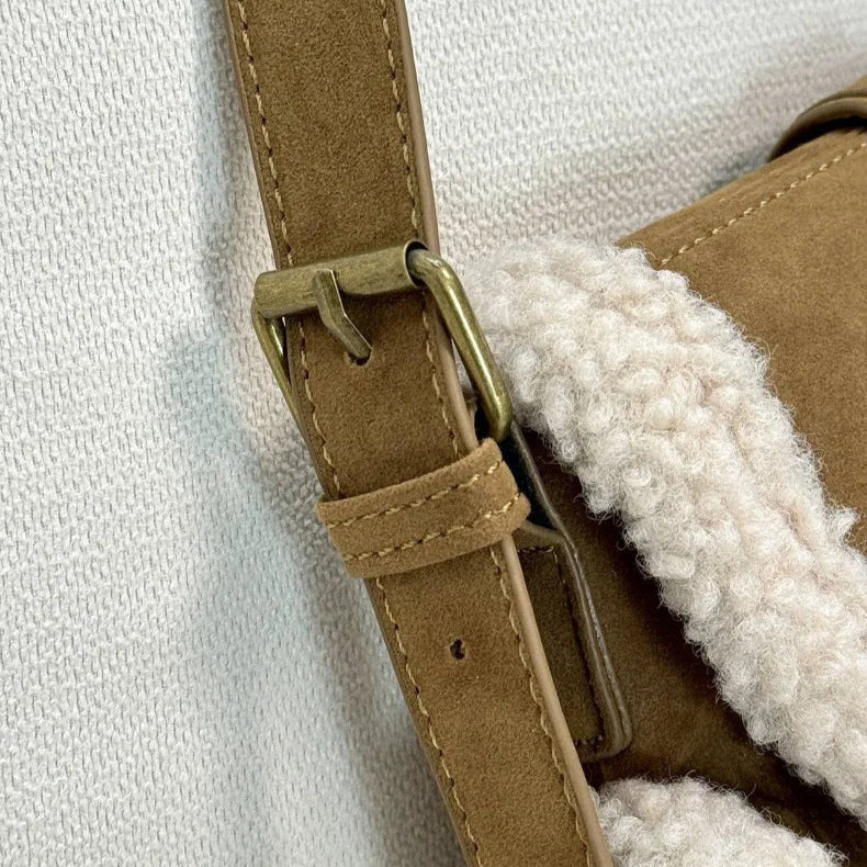 Amblot Flop-over suede handbag with fake fur