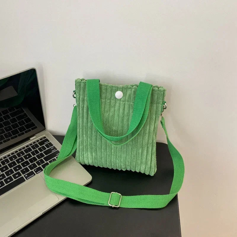 Amblot Green Corduroy handbag with front button detail