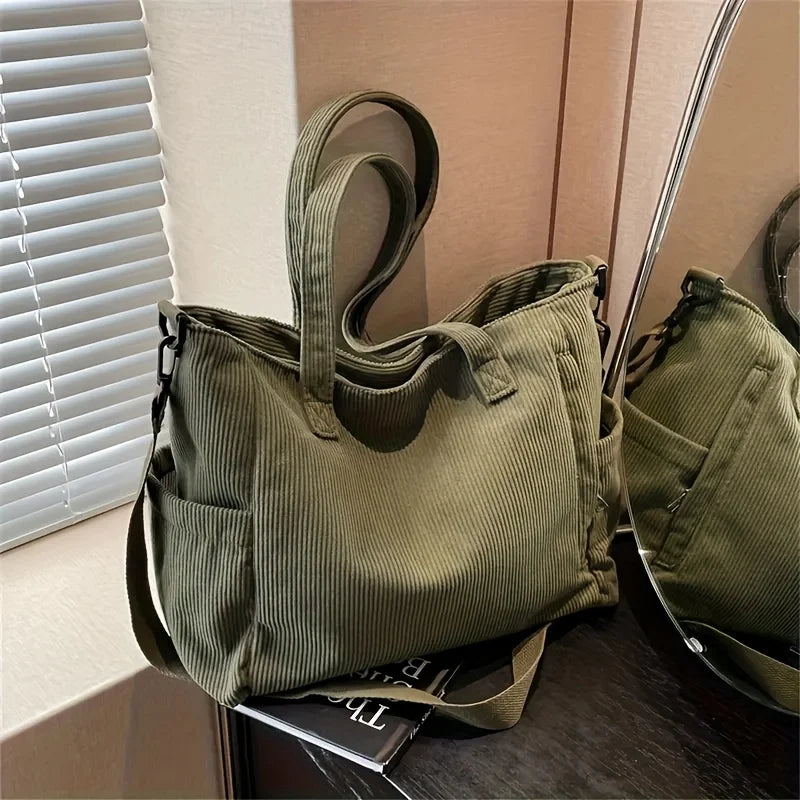 Amblot Green Corduroy tote bag with zipper closure and pockets