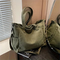 Amblot Green Corduroy tote bag with zipper closure and pockets