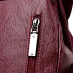 Amblot Leather knapsack with secure top flap