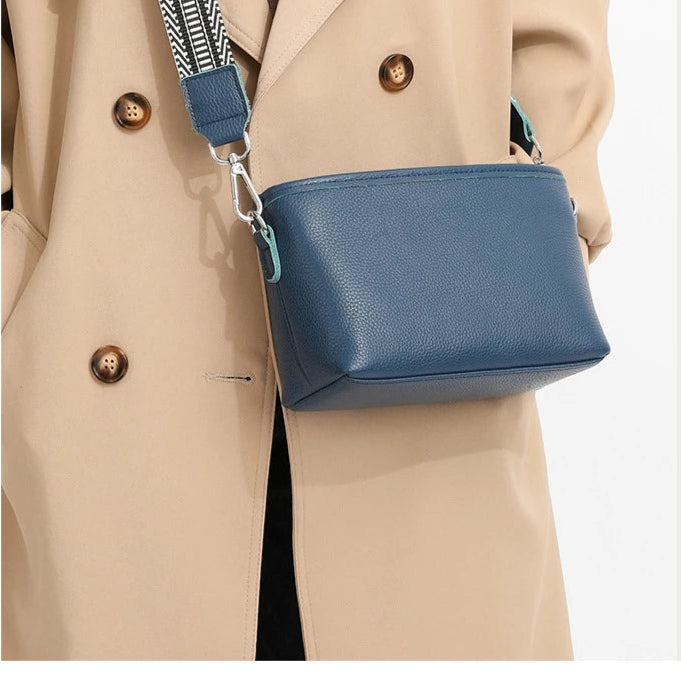 Amblot Light Blue Sleek leather shoulder handbag