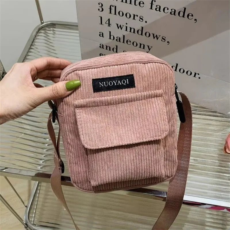 Amblot Pink Corduroy crossbody handbag with front pocket
