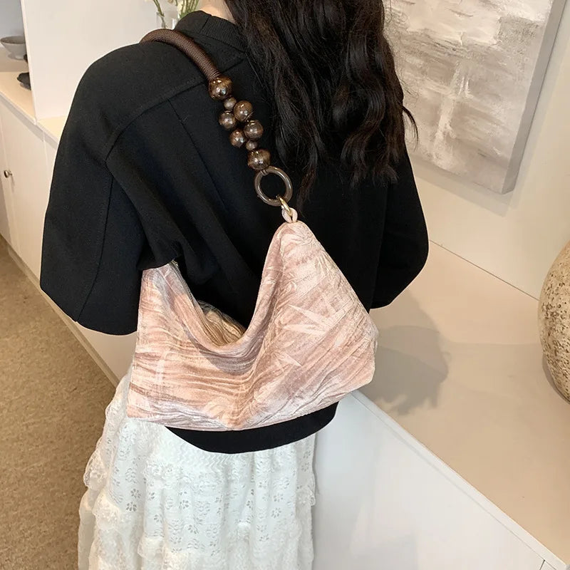 Amblot Pink Corduroy handbag with wooden bead handle