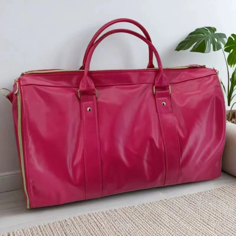 Amblot Pink Elegant leather duffle bag with shoulder strap