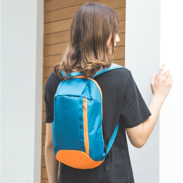 Small light blue hiking backpack