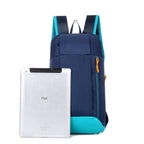 Small blue hiking backpack
