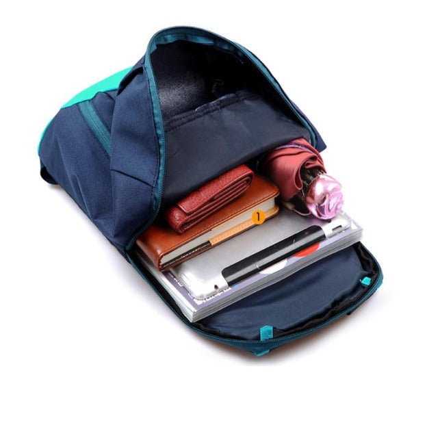Small blue hiking backpack