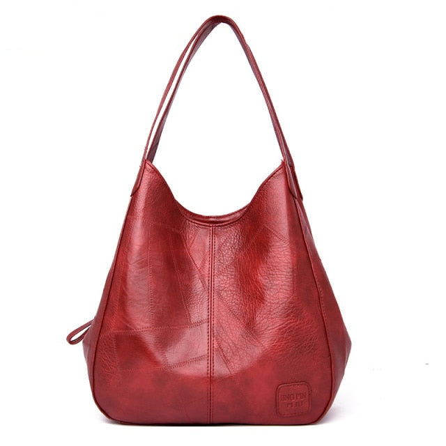 Red leather hobo bag