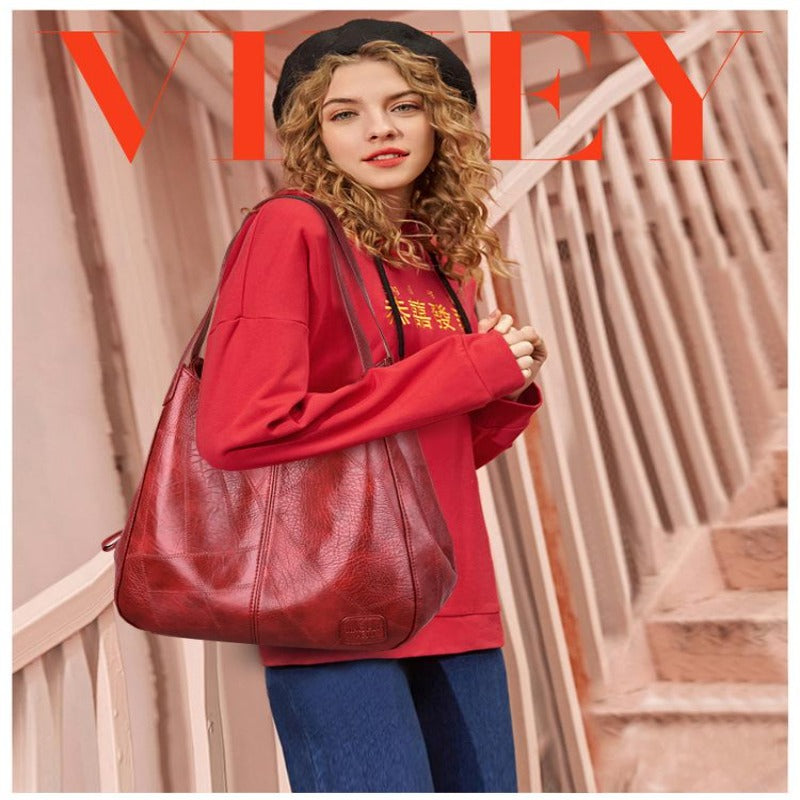 Red leather hobo bag