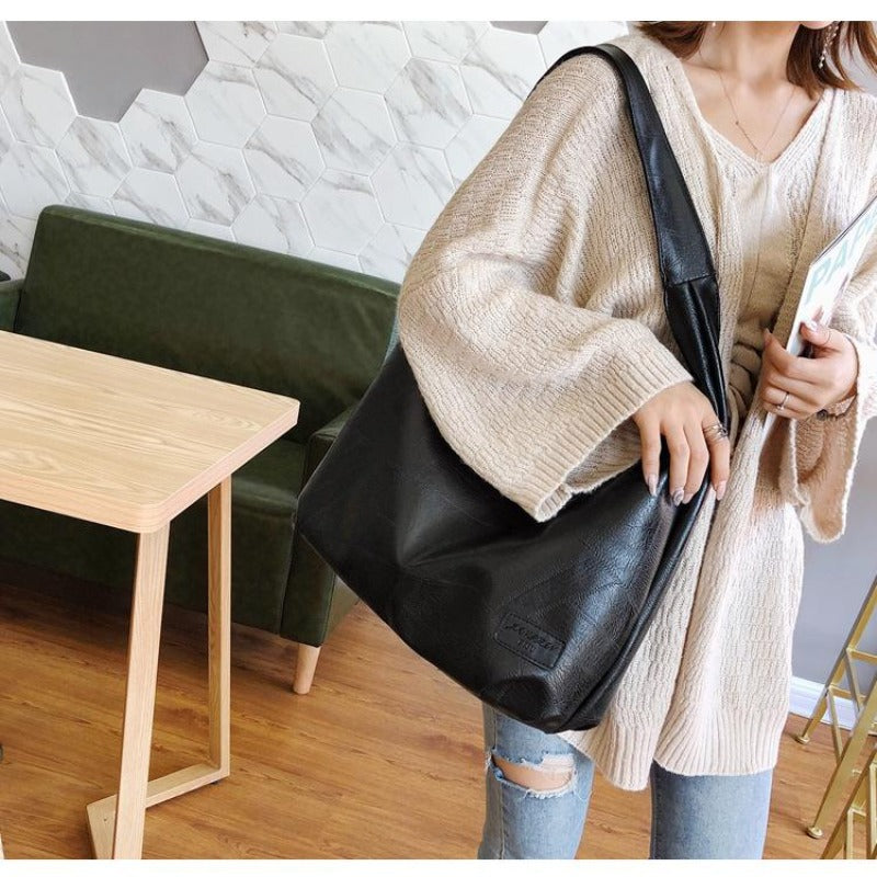 Black leather hobo bag