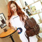 Vintage dark brown leather backpack