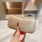 Amblot Rectangular corduroy purse with shiny handle