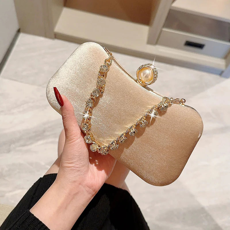 Amblot Rectangular corduroy purse with shiny handle