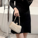 Amblot Rectangular corduroy purse with shiny handle