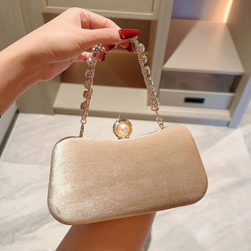 Amblot Rectangular corduroy purse with shiny handle